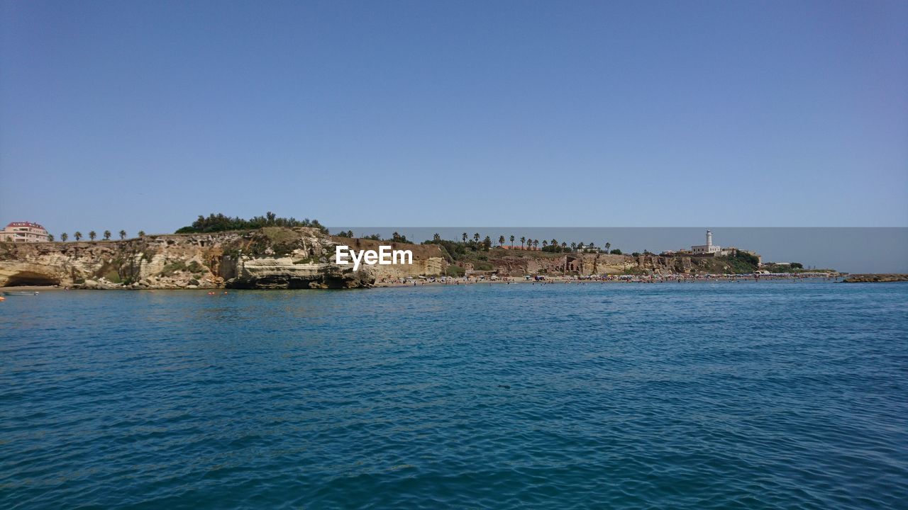 Scenic view of sea against clear sky