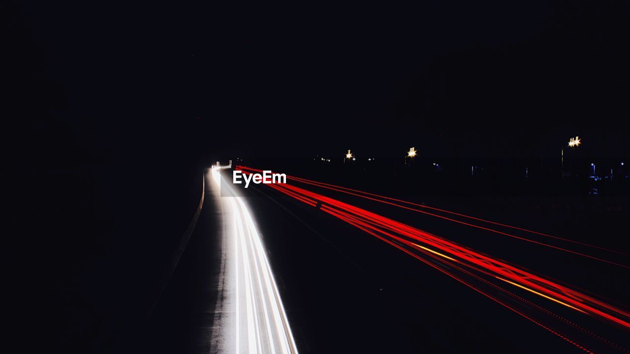 LIGHT TRAILS ON HIGHWAY