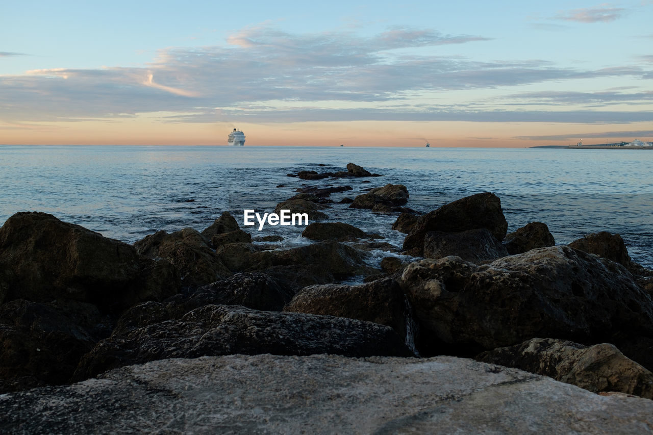 Scenic view of sea against sky during sunset