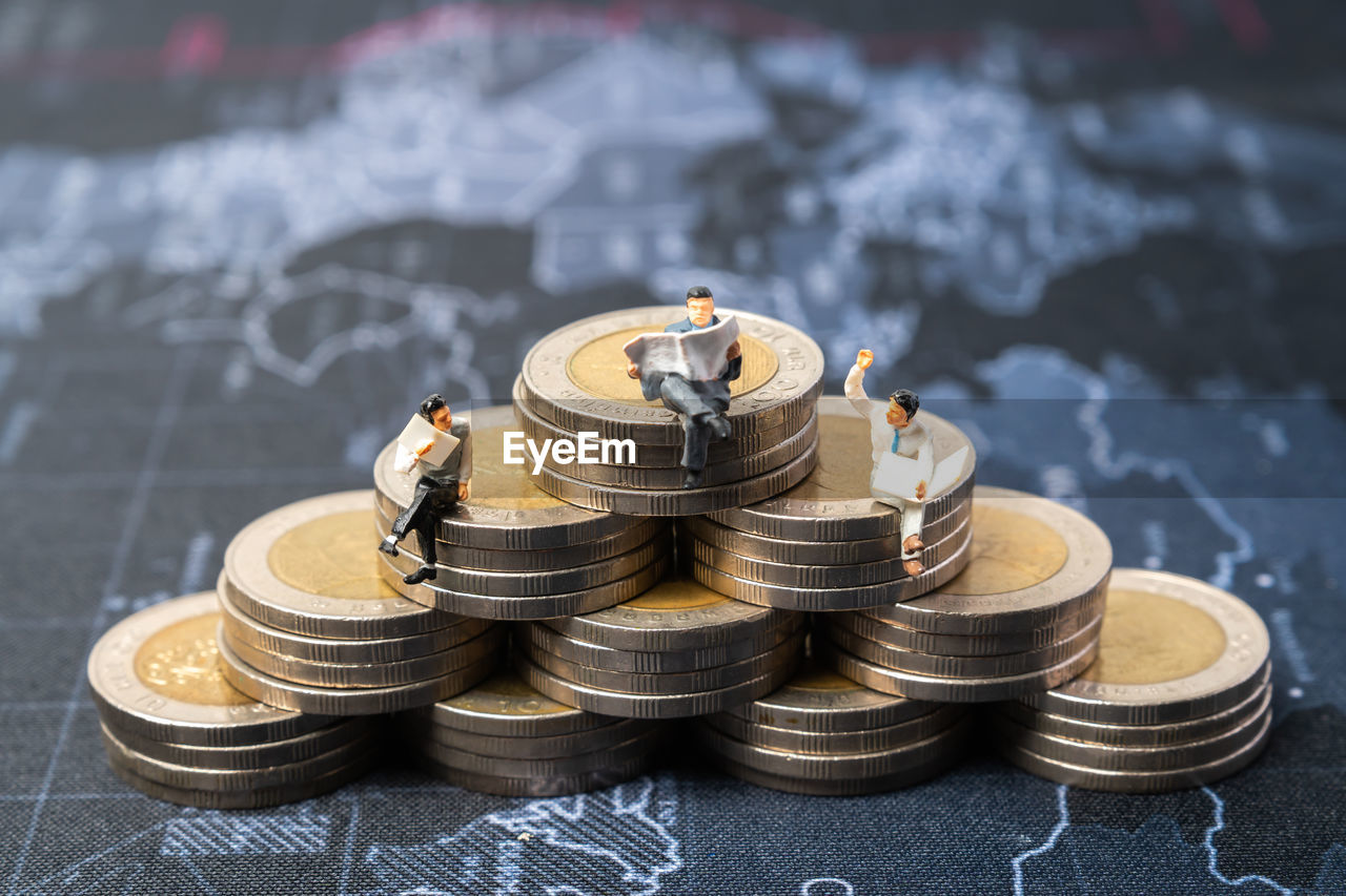 HIGH ANGLE VIEW OF COINS