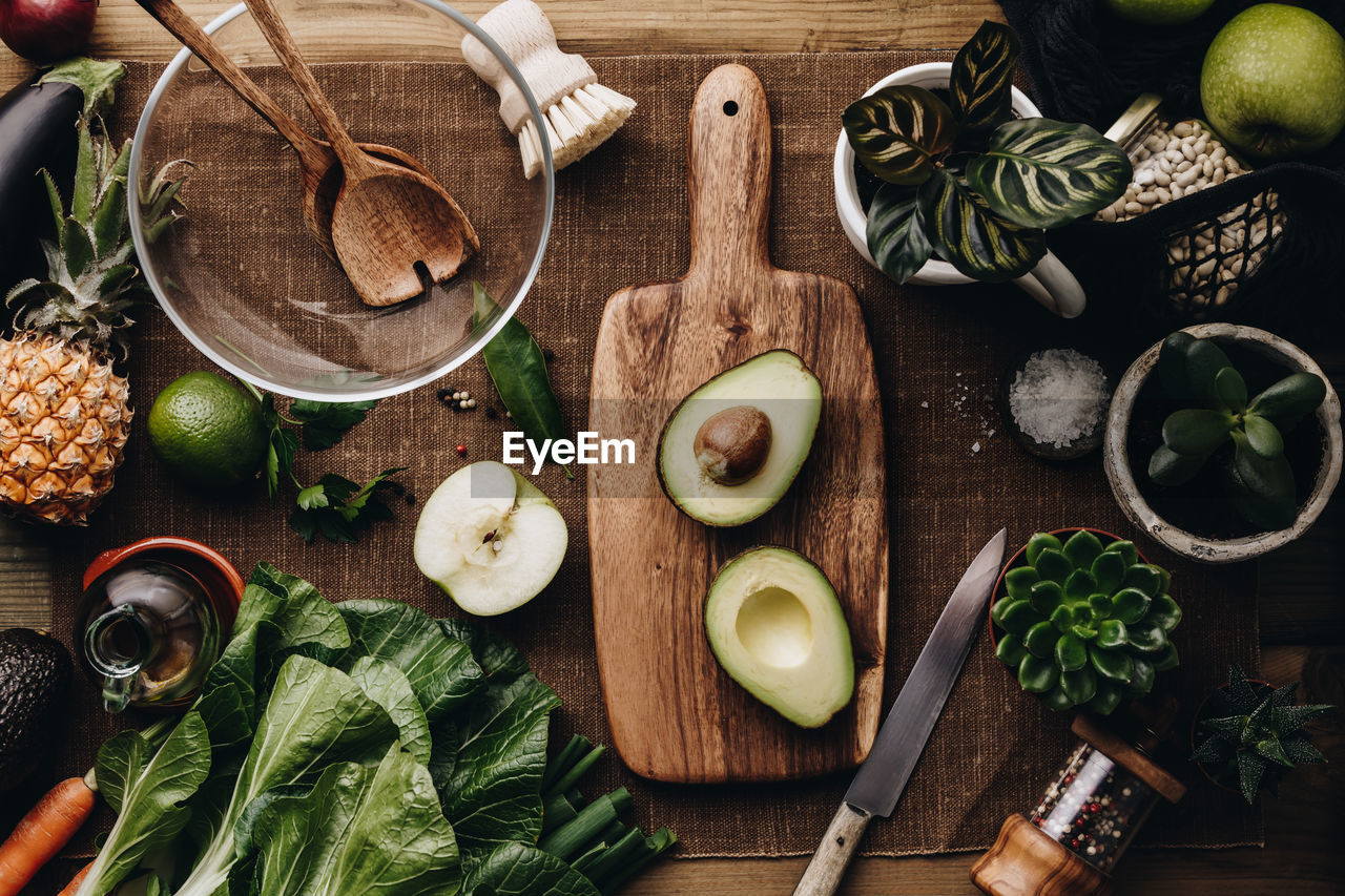 Directly above shot of vegetables by bowl on table