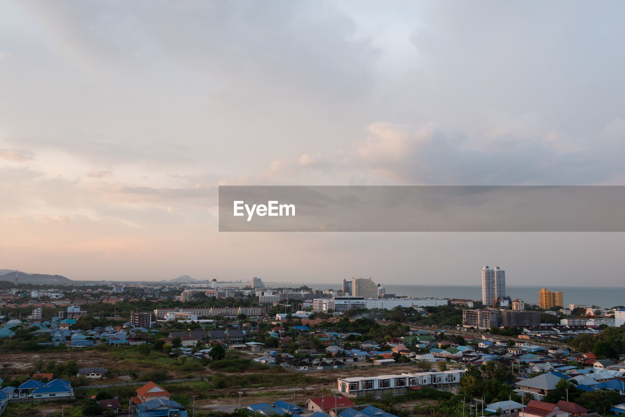 High angle view of city at sunset