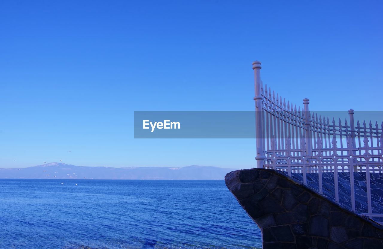 View of sea against blue sky