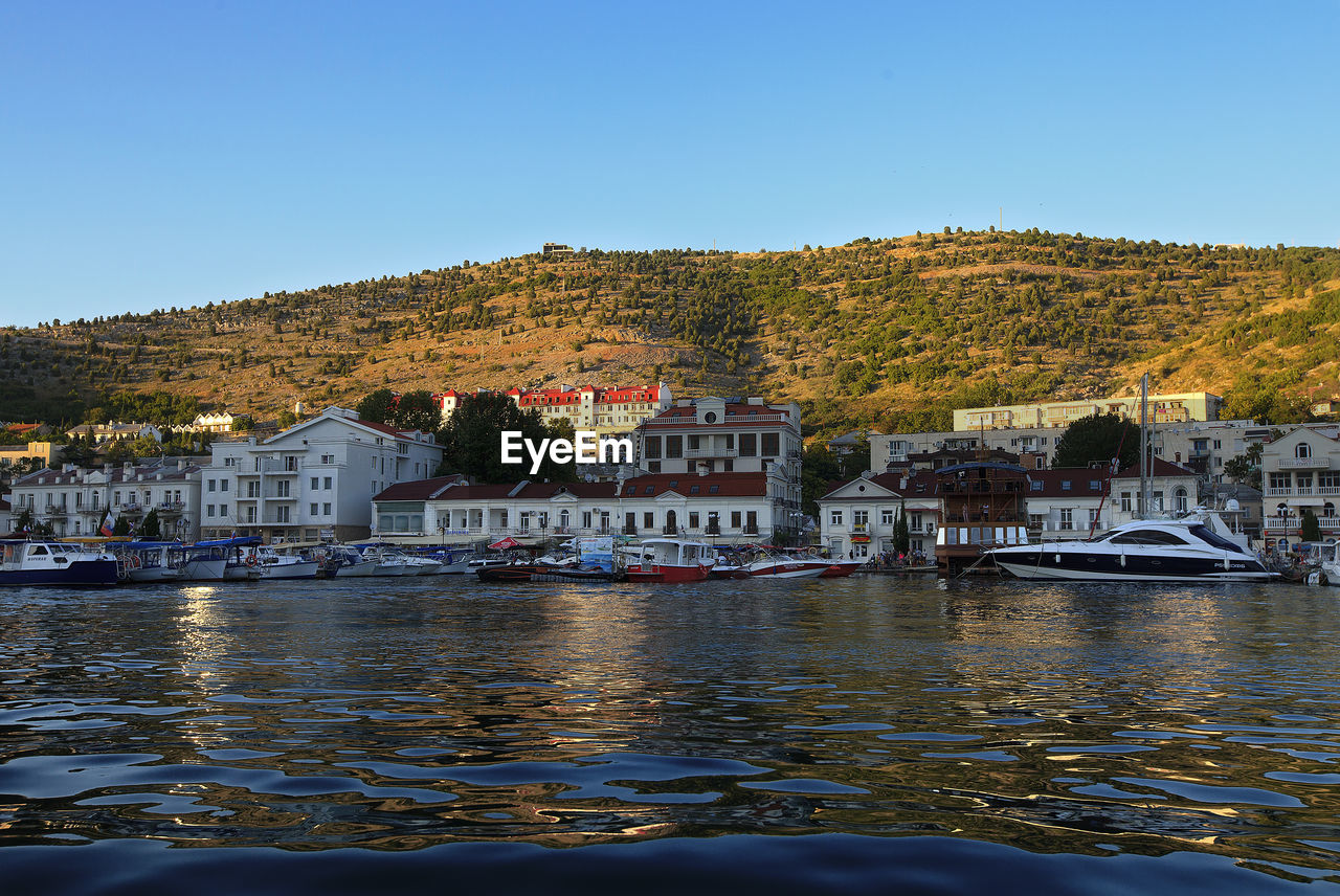 Yacht parking, a marina lot, yacht and sailboat is moored at the quay,