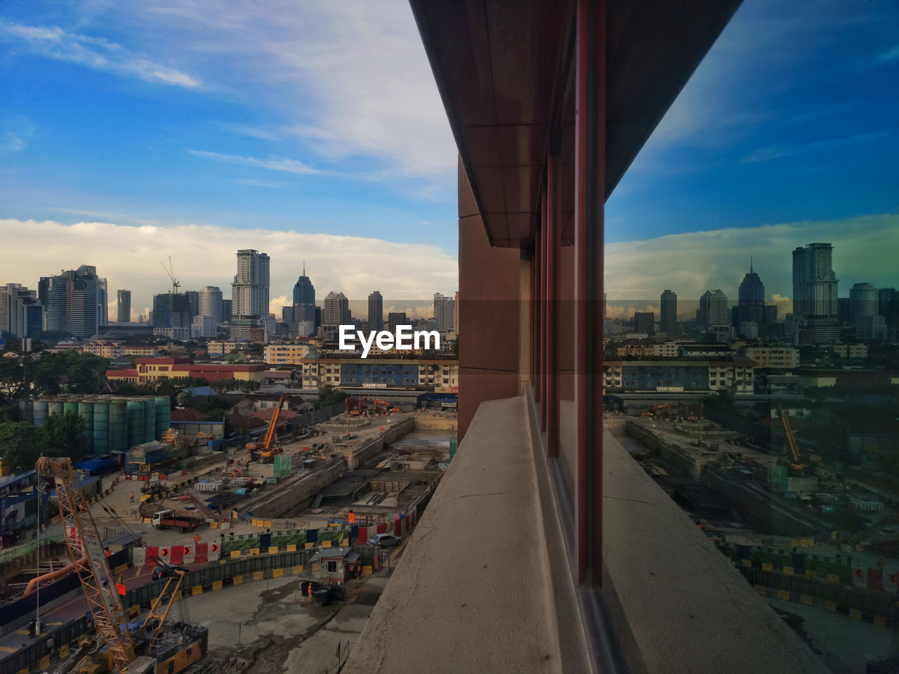 Modern buildings in city against sky