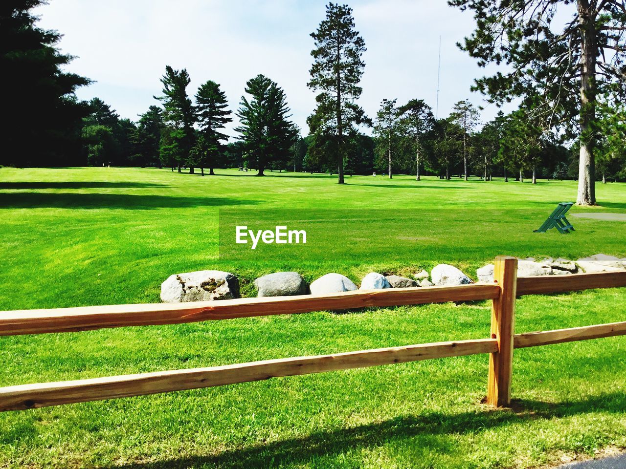 SCENIC VIEW OF GOLF COURSE AGAINST SKY