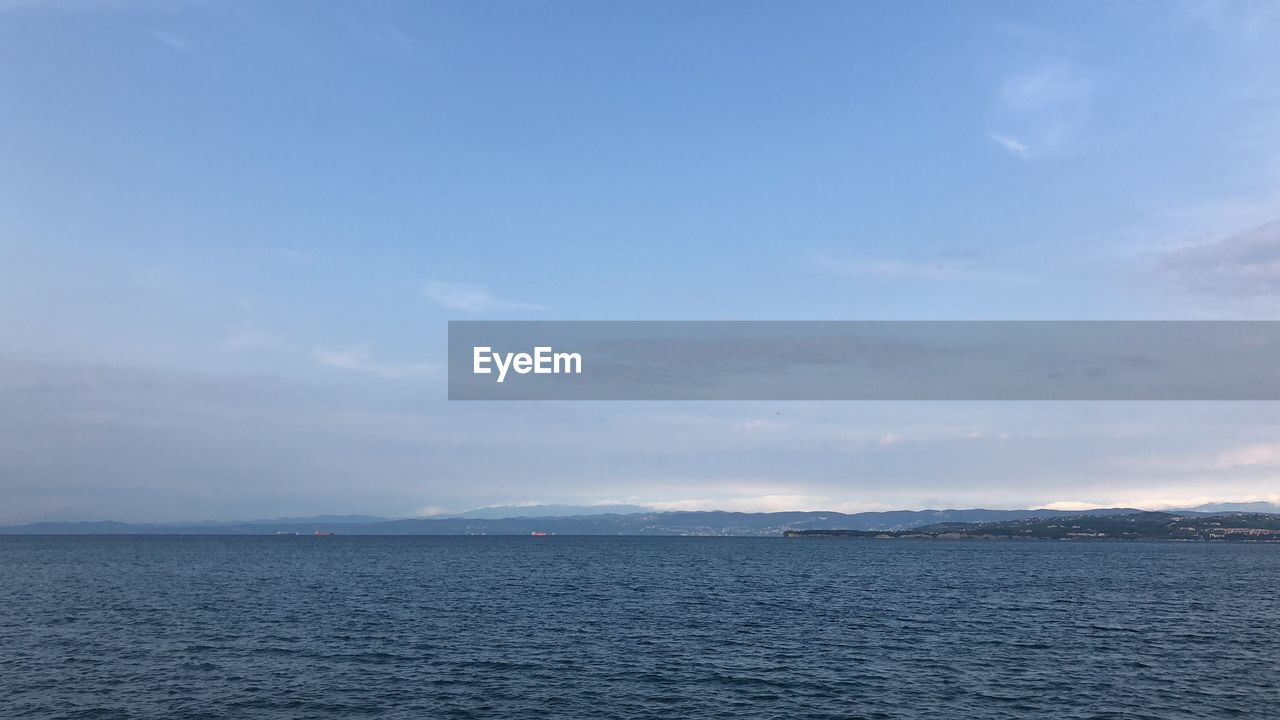 TRANQUIL VIEW OF SEA AGAINST SKY