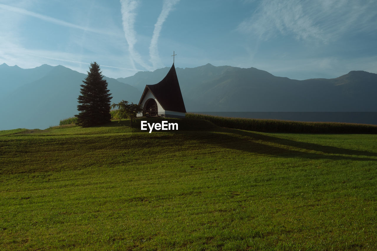 built structure on field against sky