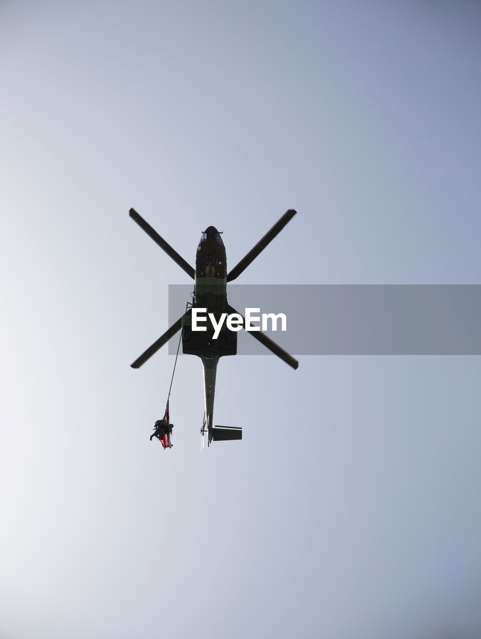 LOW ANGLE VIEW OF AIRPLANE AGAINST SKY