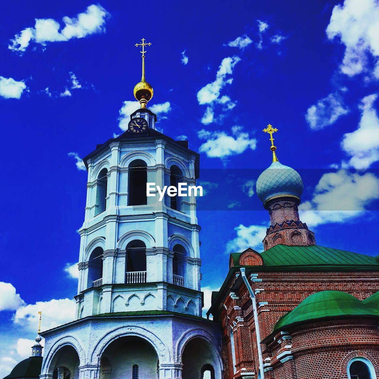 Low angle view of russian orthodox church against blue sky