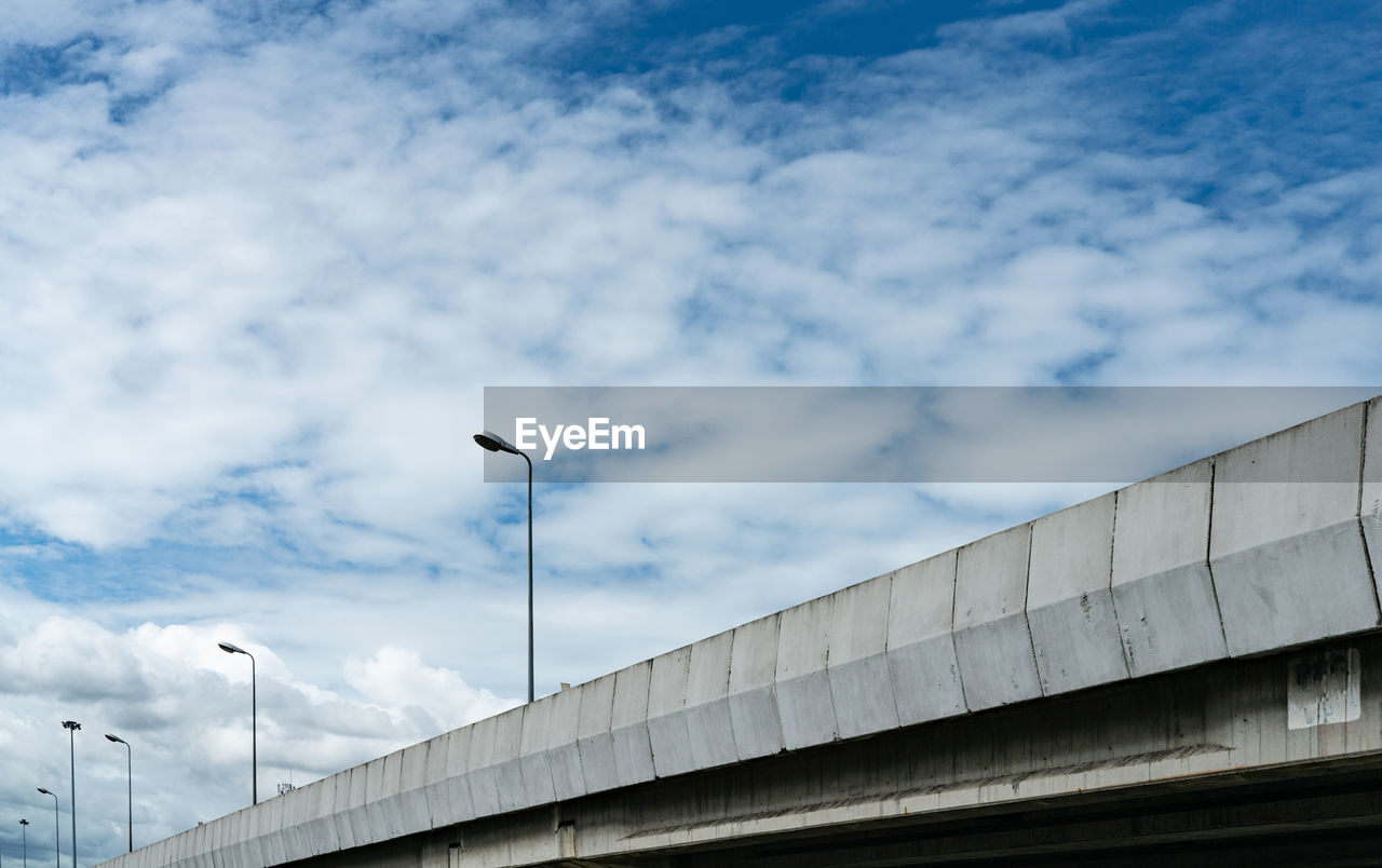 Elevated concrete highway and street lamp pole. overpass concrete road. road flyover. motorway.