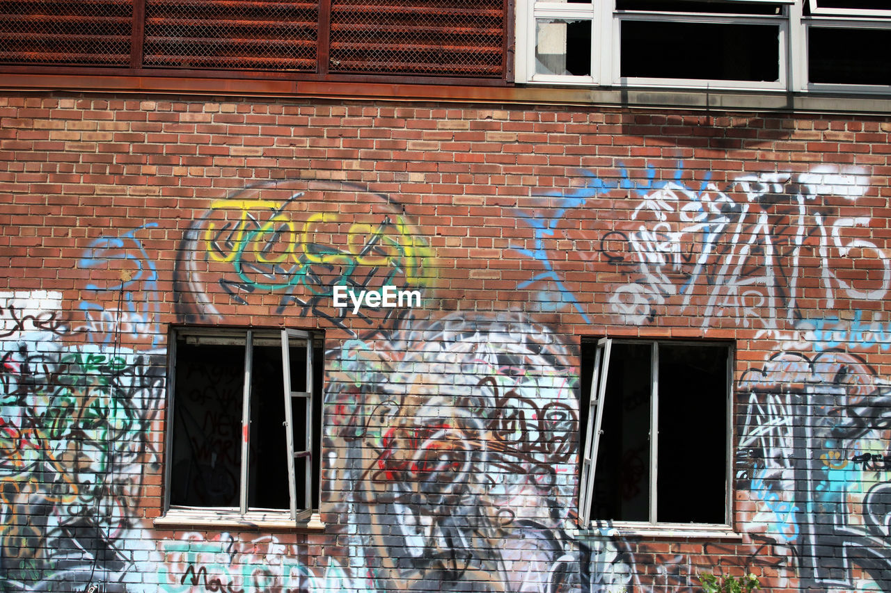 CLOSE-UP OF GRAFFITI ON BUILDING