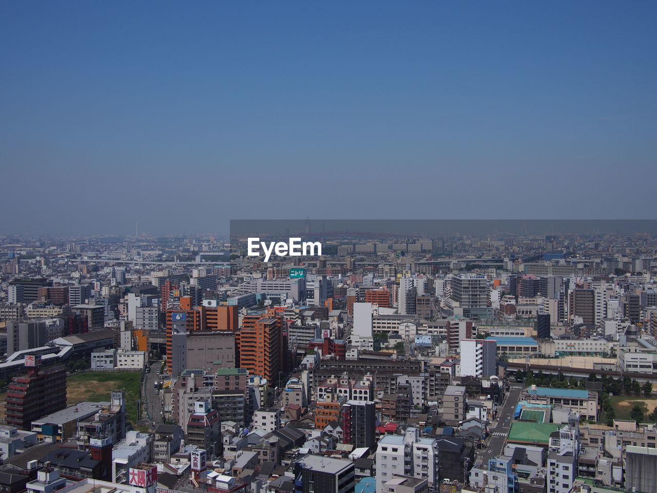 Cityscape against clear sky