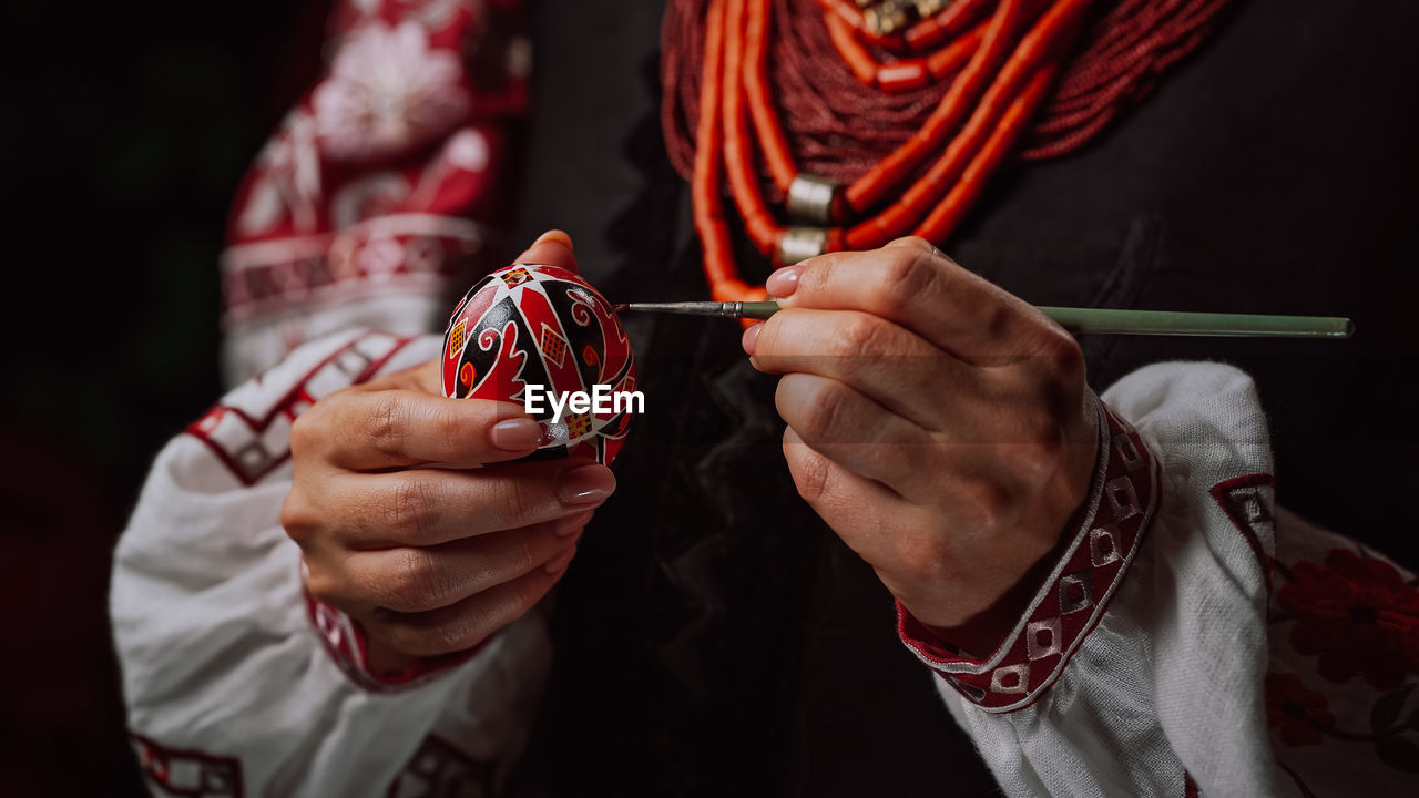 cropped hand of person holding food