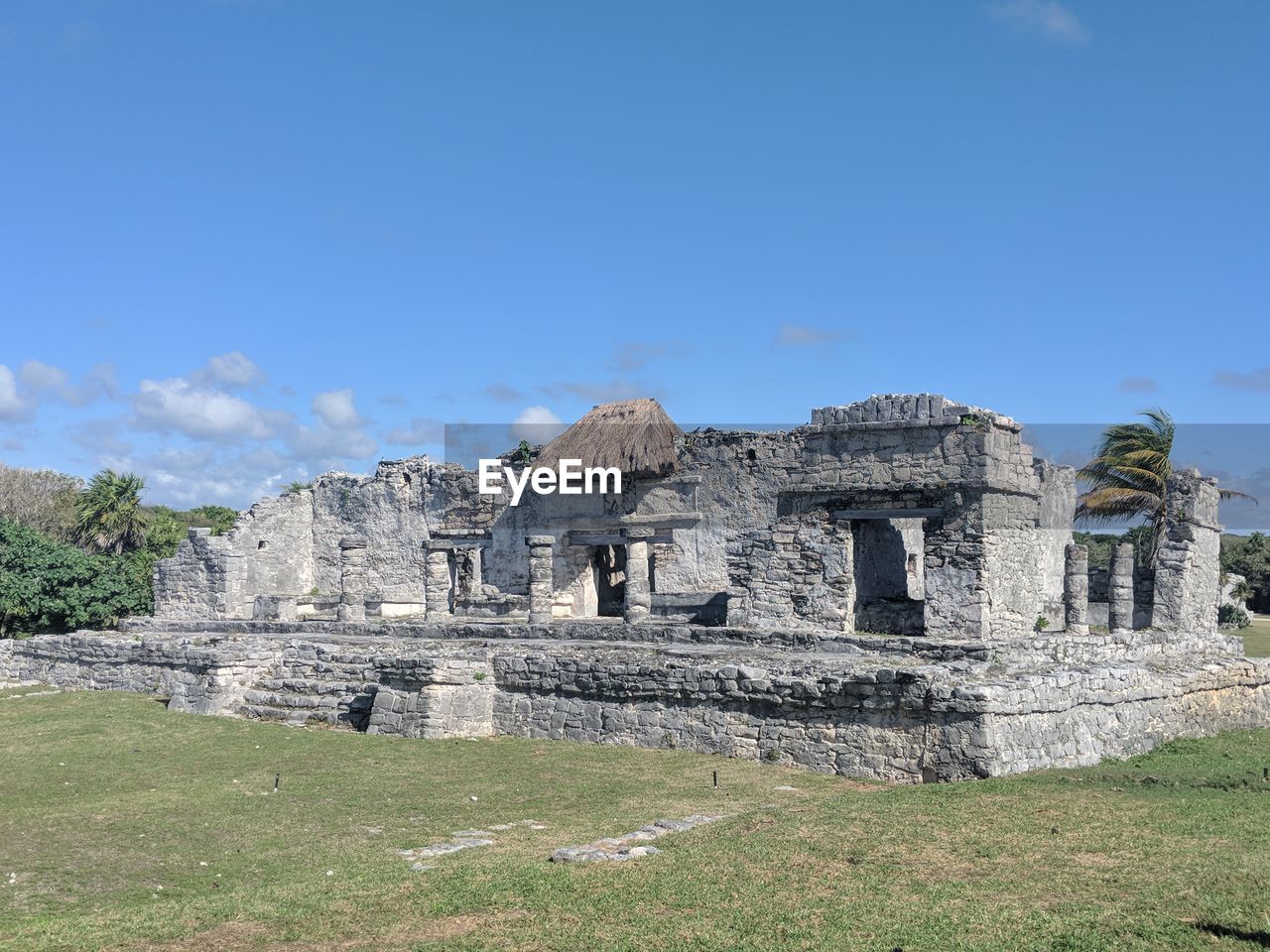 Old ruined building against blue sky