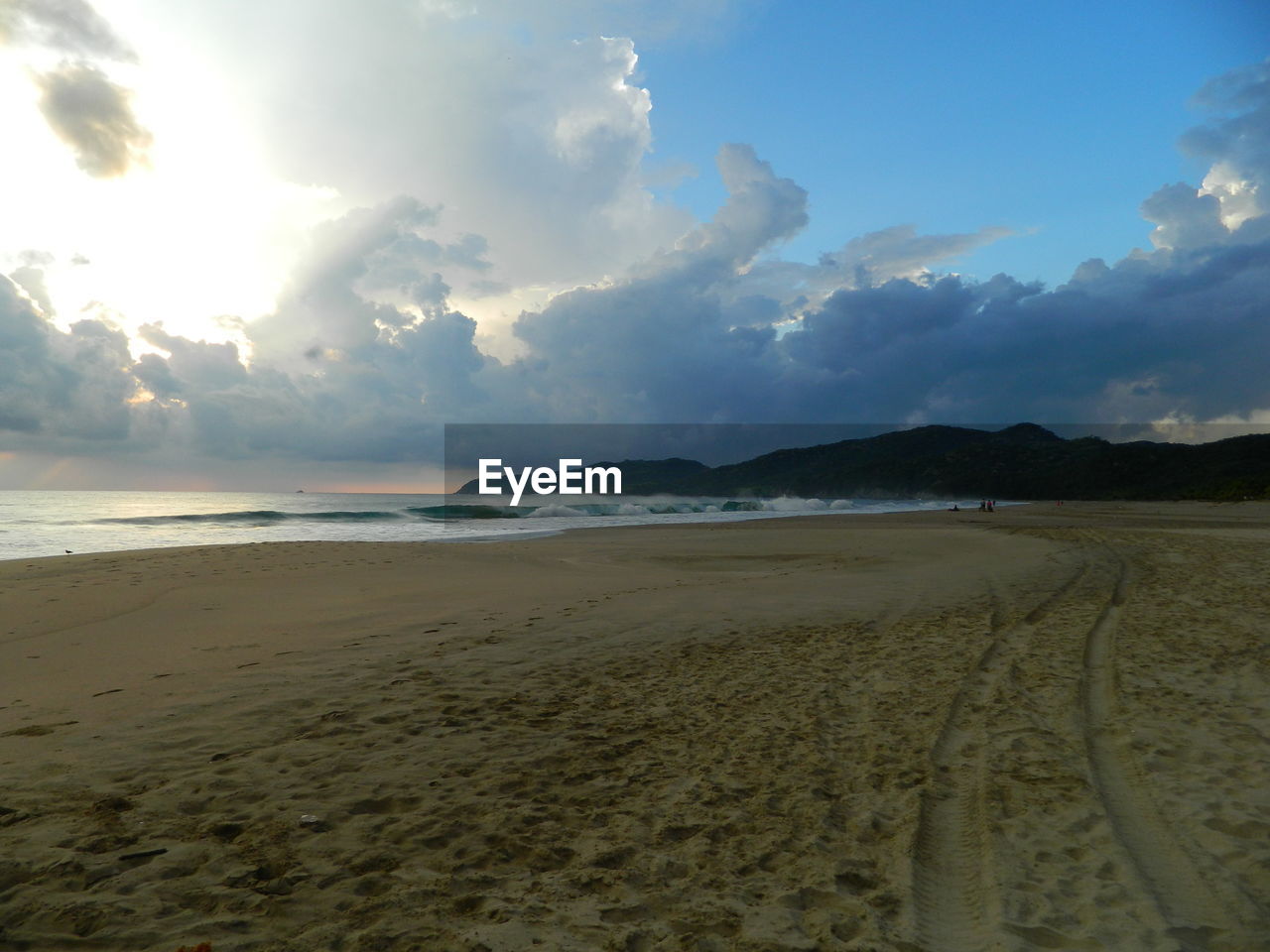 BEACH AGAINST SKY