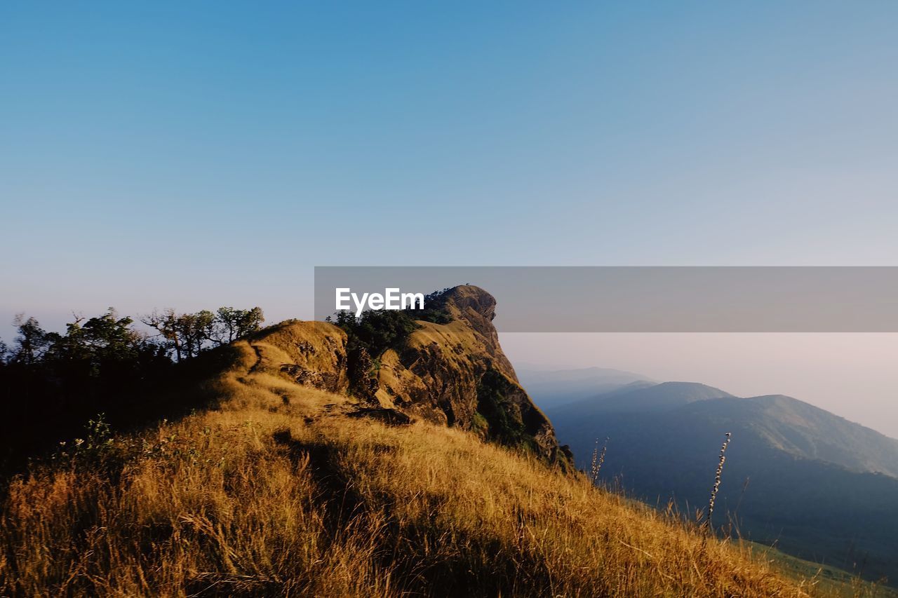 Scenic view of mountains against clear sky