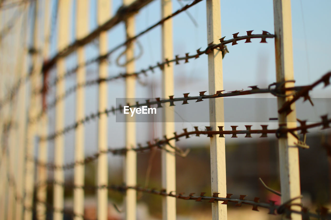 Close-up of wire on fence