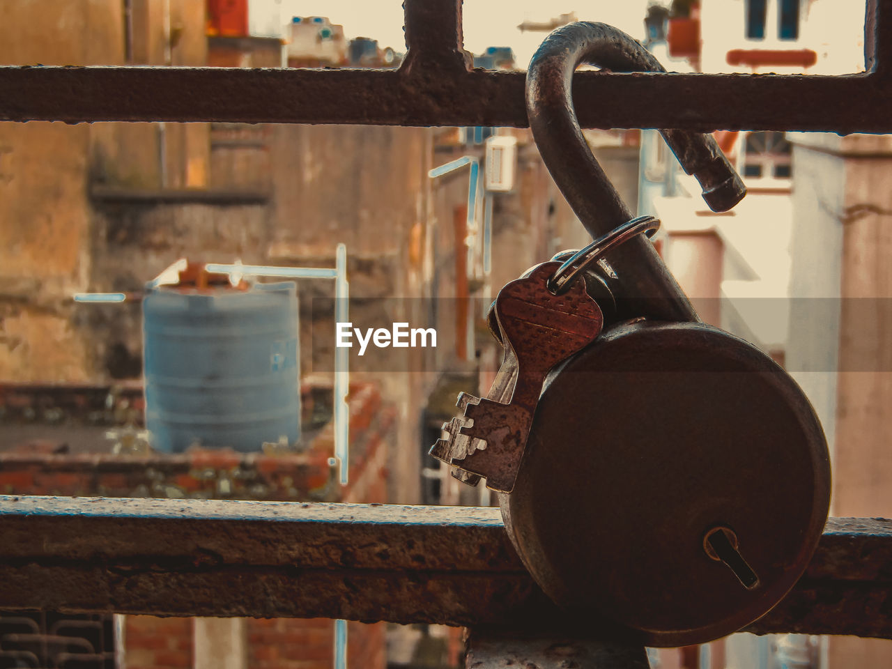 Close-up of padlocks on railing