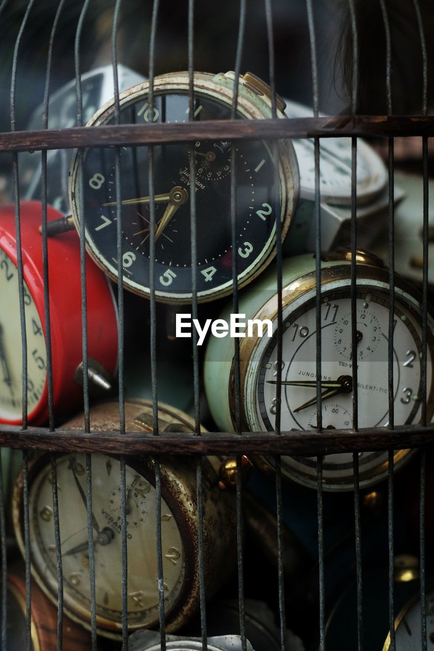Close-up of clock in metallic container