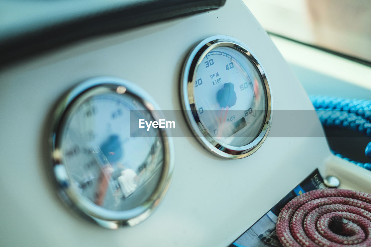 CLOSE-UP OF VINTAGE CAR ON MIRROR