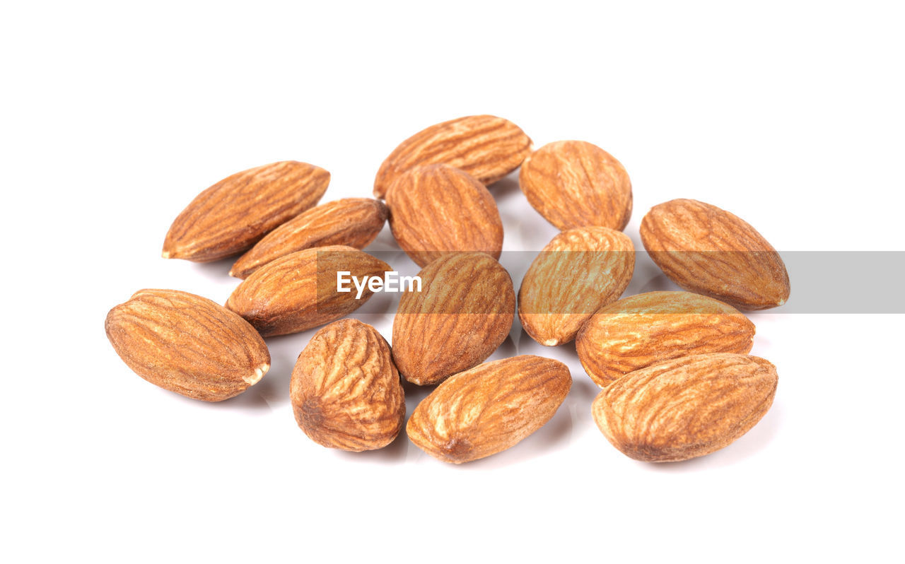 food and drink, food, plant, nuts & seeds, white background, nut - food, produce, almond, fruit, nut, healthy eating, wellbeing, cut out, freshness, studio shot, indoors, brown, no people, dried food, close-up, dried fruit, snack, large group of objects, group of objects, group