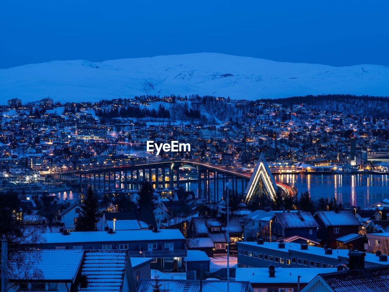 HIGH ANGLE VIEW OF CITYSCAPE DURING WINTER