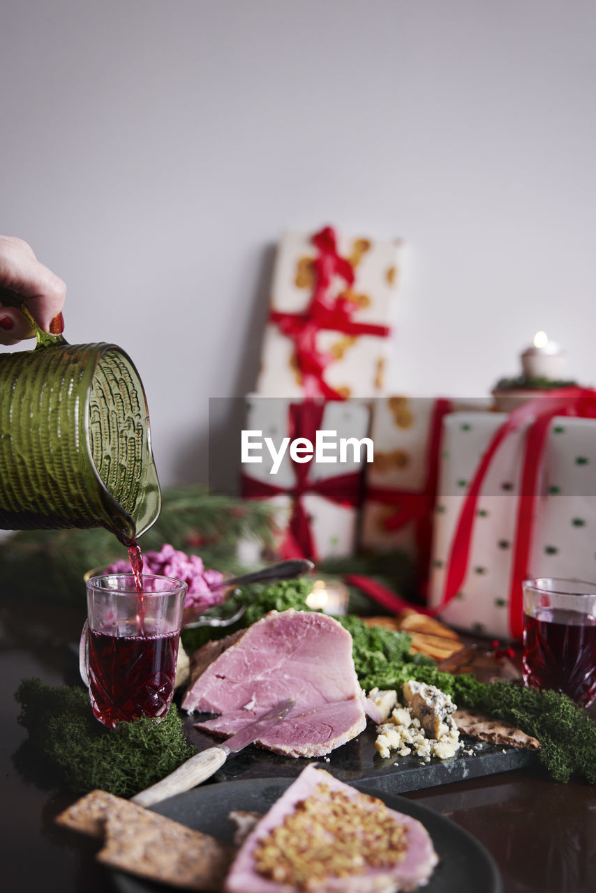 Christmas food and presents on table