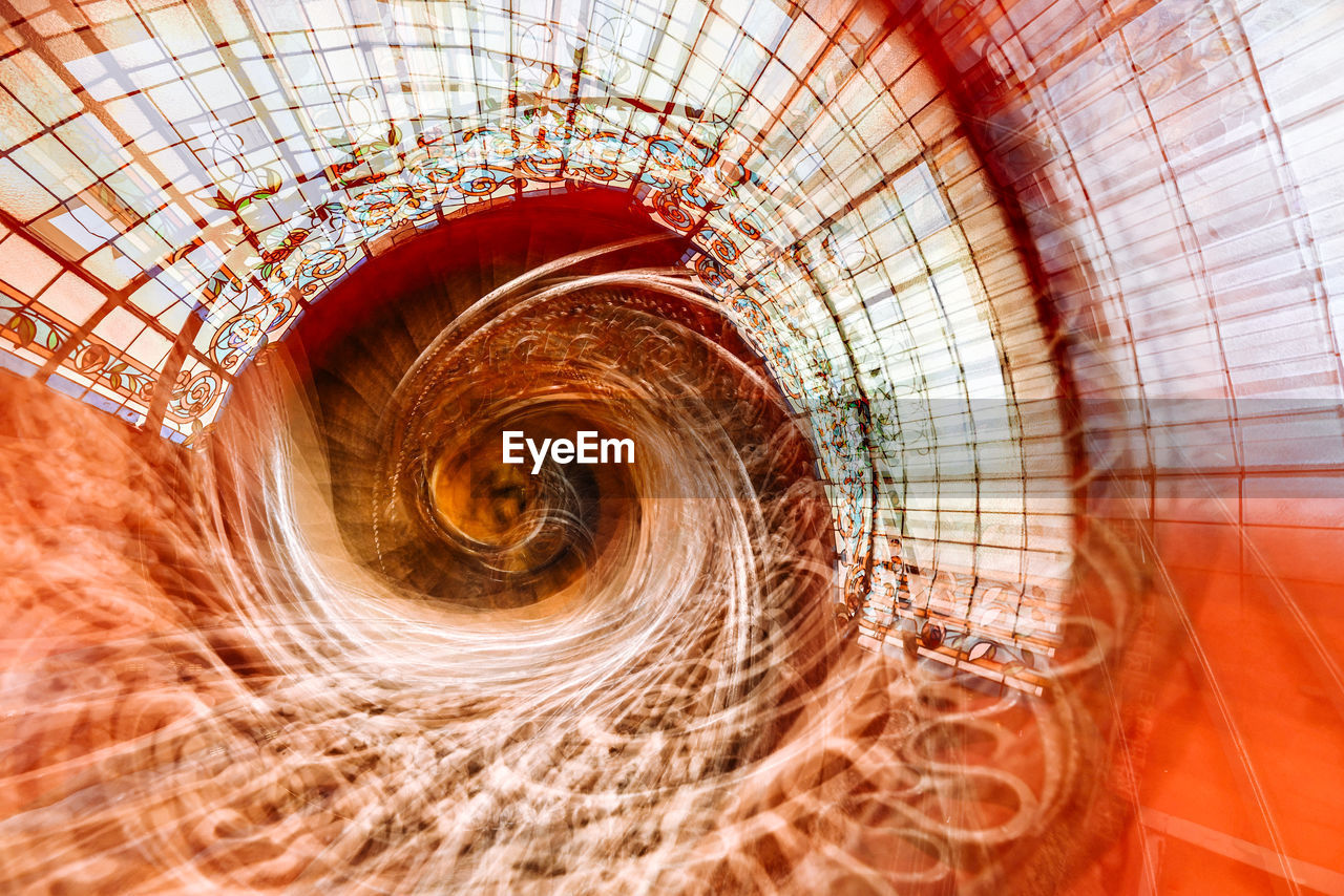 Digital composite image of spiral staircase