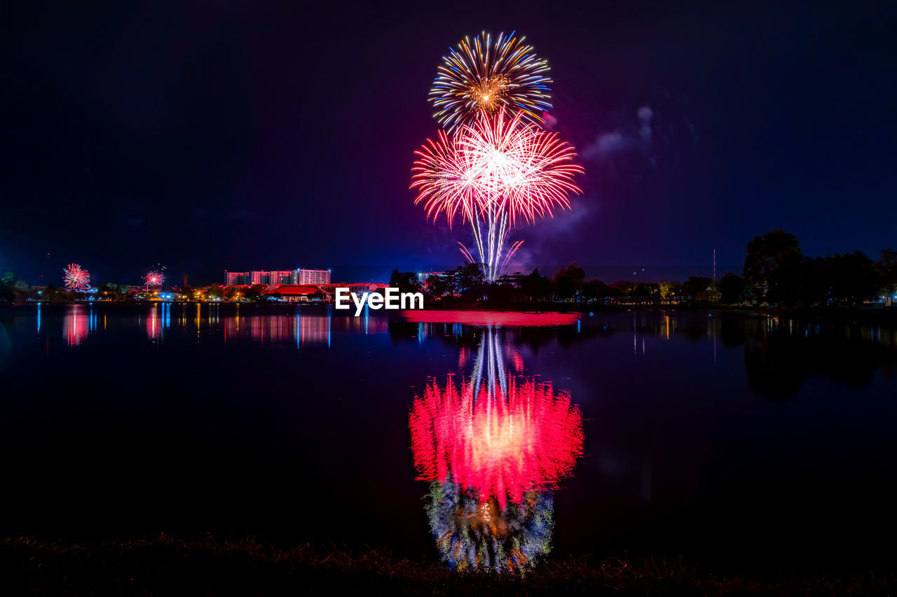 FIREWORK DISPLAY OVER RIVER