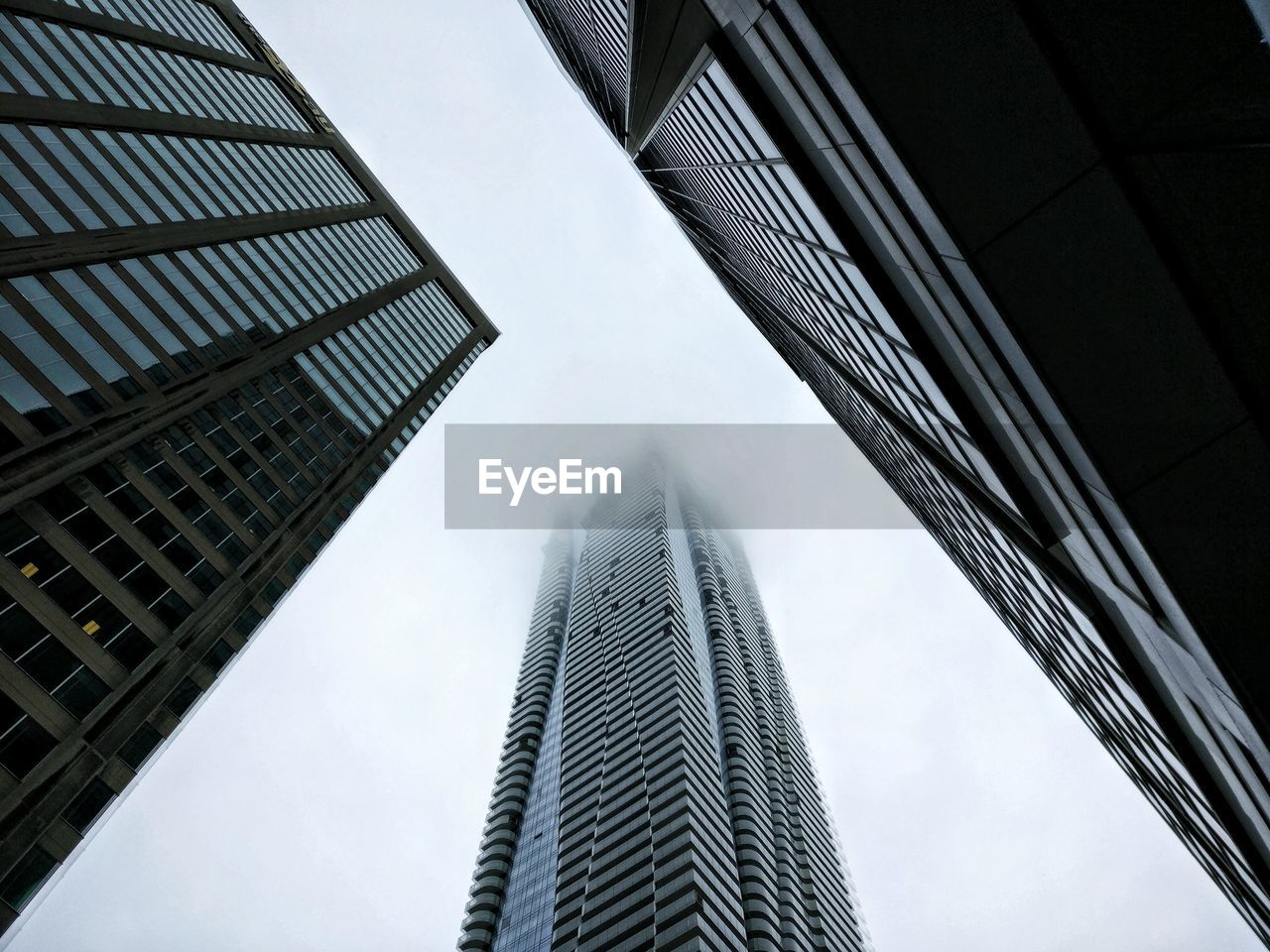 Low angle view of skyscrapers against sky