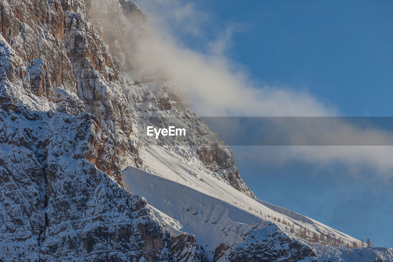 Detail of mount pelmo slope during a winter sunset, dolomites, italy