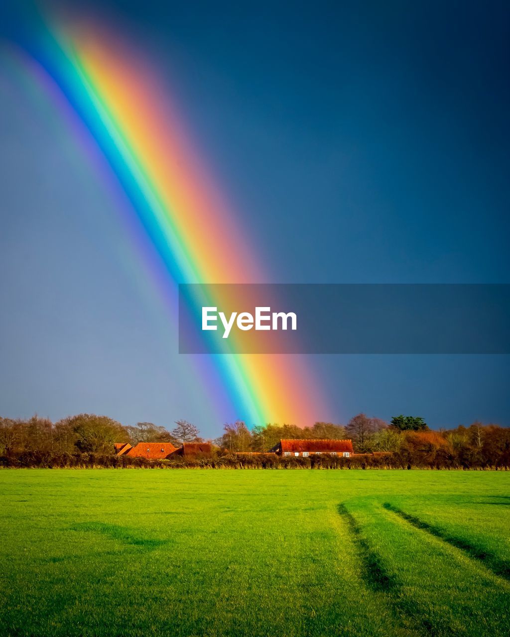 SCENIC VIEW OF RAINBOW AGAINST SKY DURING SUNSET