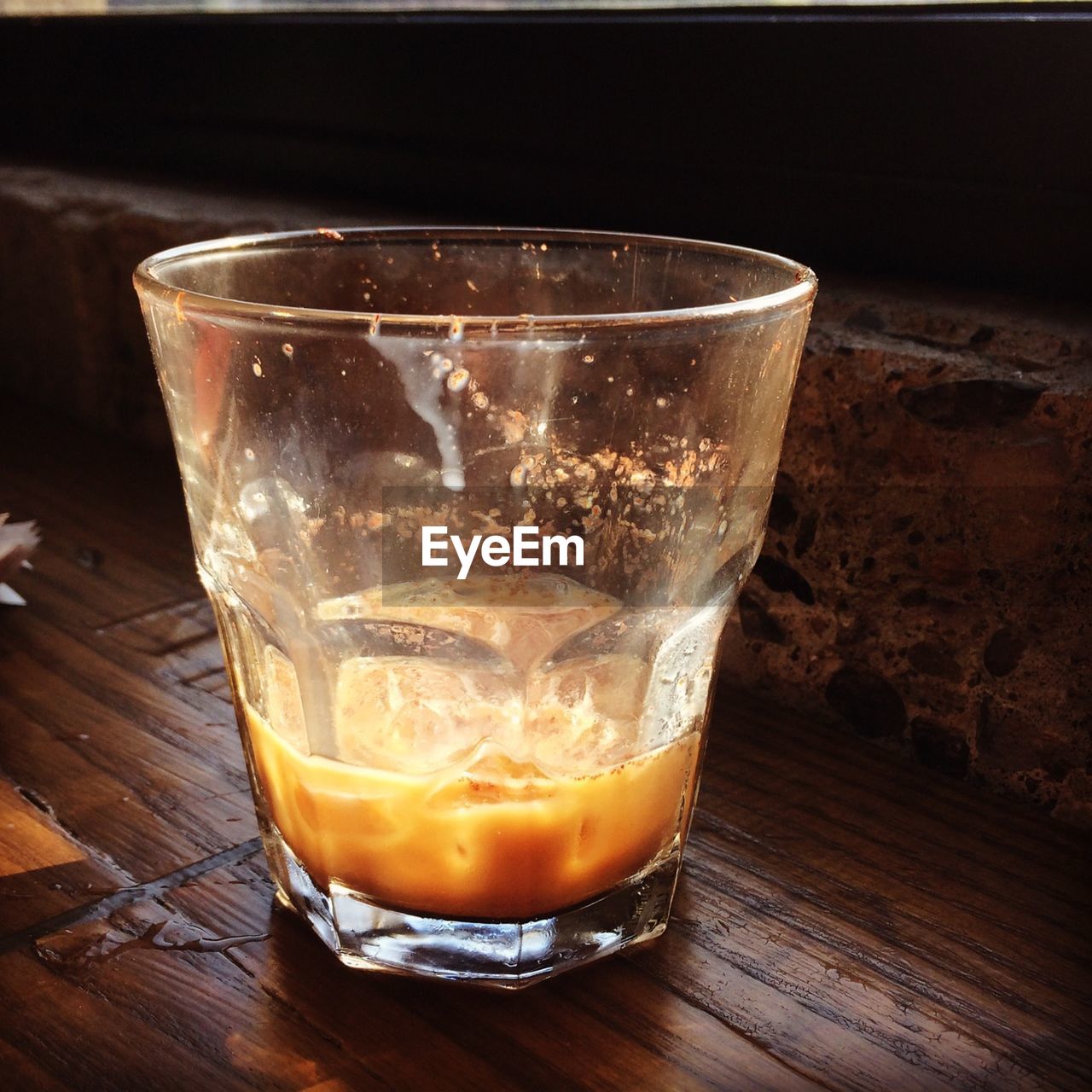 Close-up of iced coffee on table at home