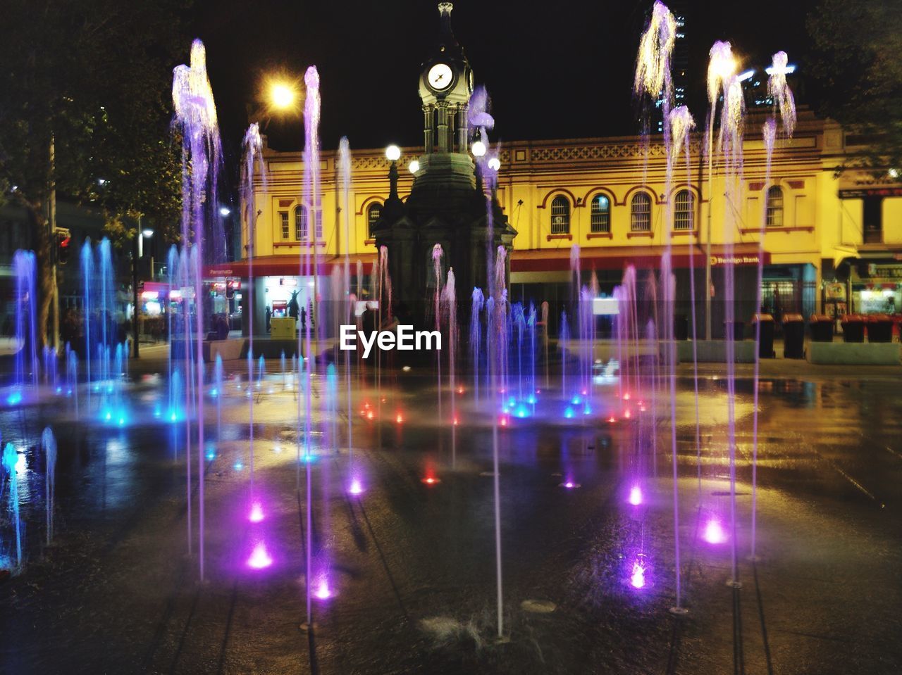 ILLUMINATED BUILDINGS AT NIGHT