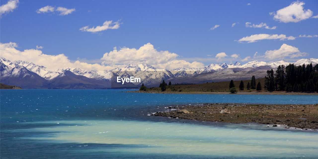 View of lake against cloudy sky