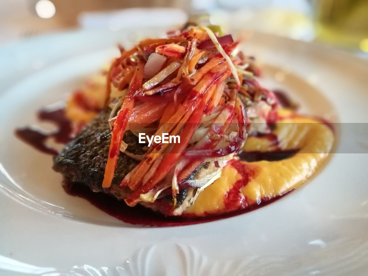 CLOSE-UP OF MEAT SERVED IN PLATE