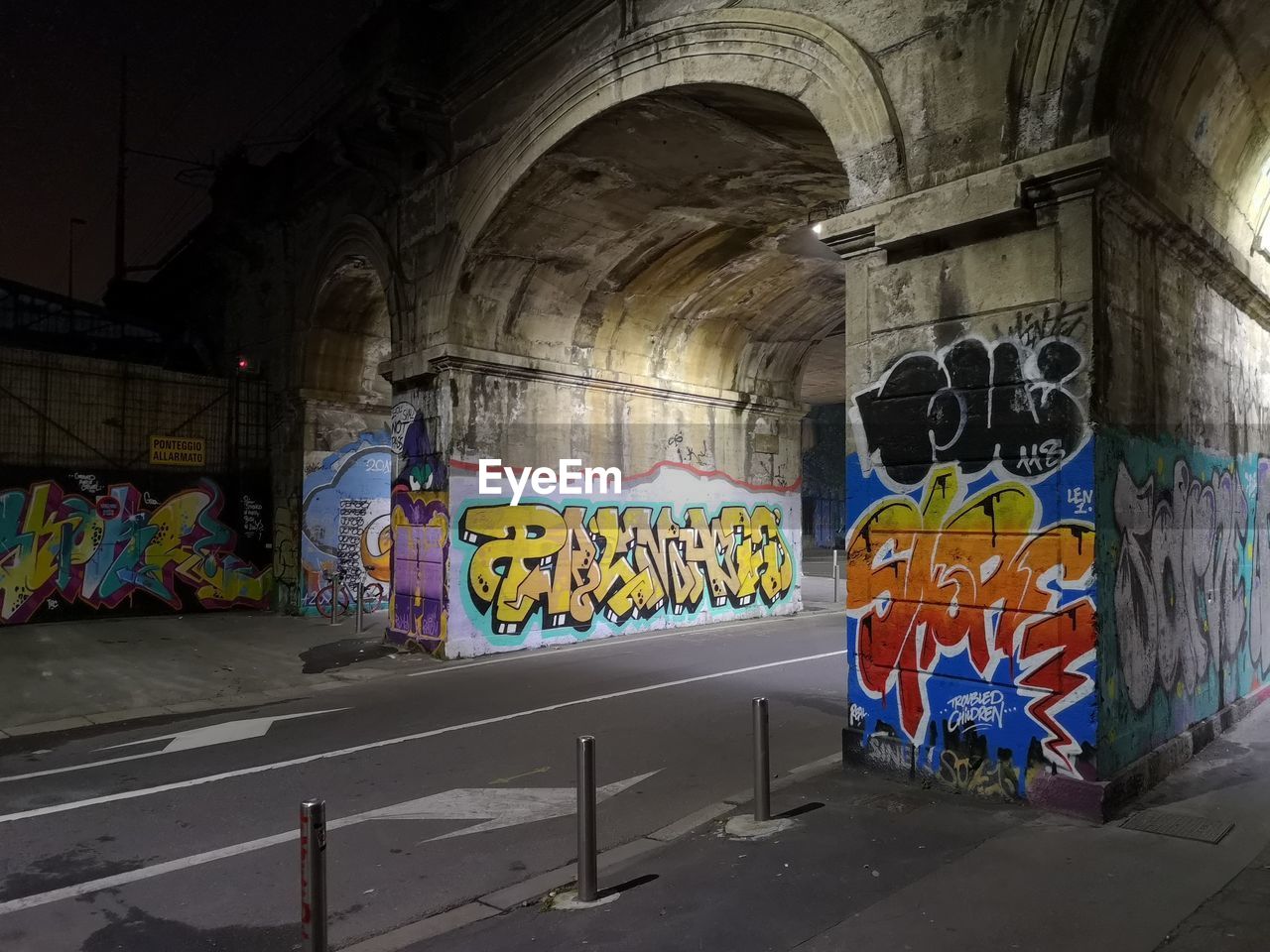 GRAFFITI ON ABANDONED WALL IN TUNNEL