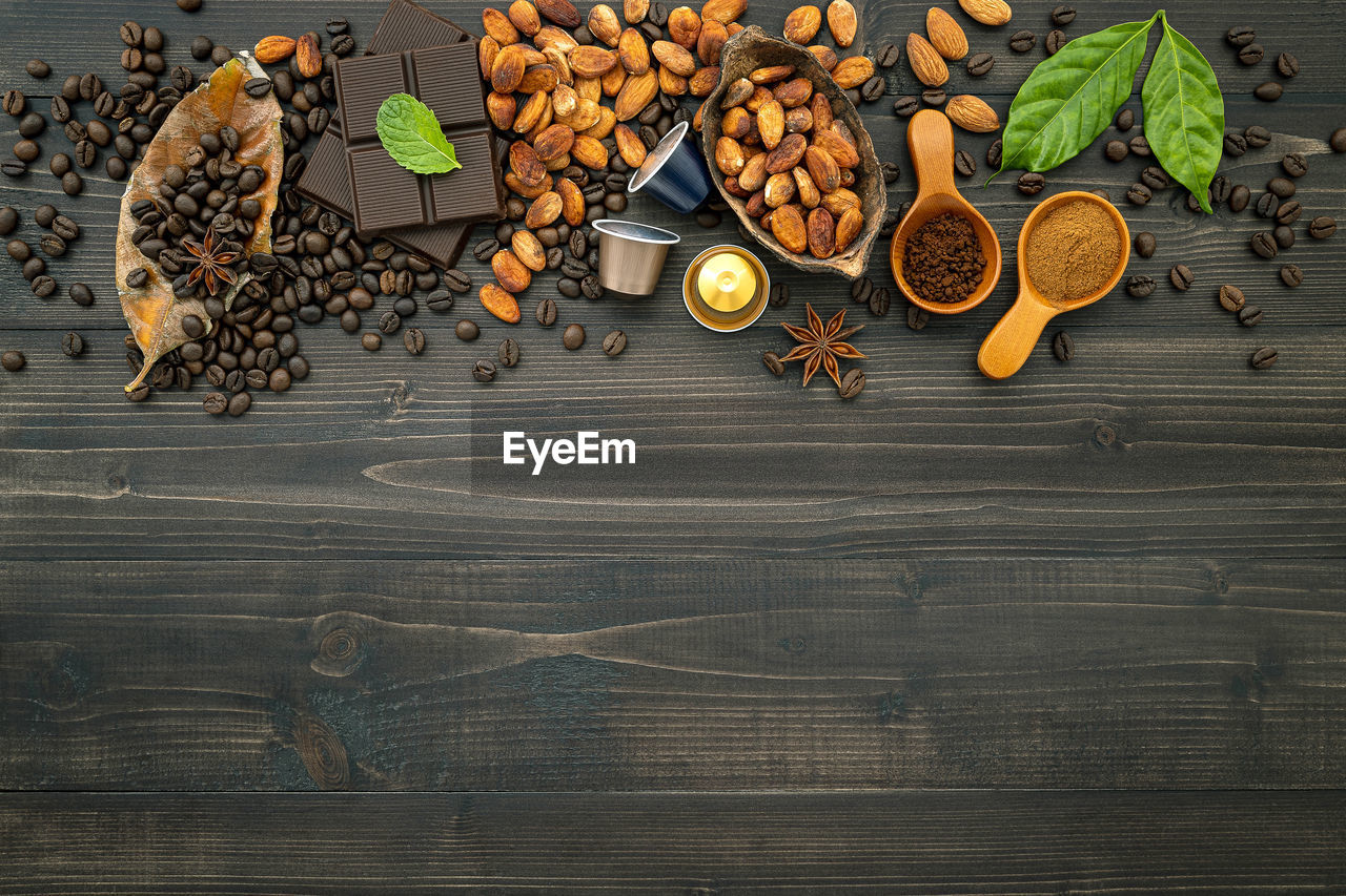 HIGH ANGLE VIEW OF COFFEE BEANS ON TABLE IN CAFE