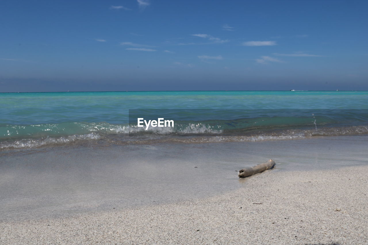 VIEW OF SEA AGAINST BLUE SKY