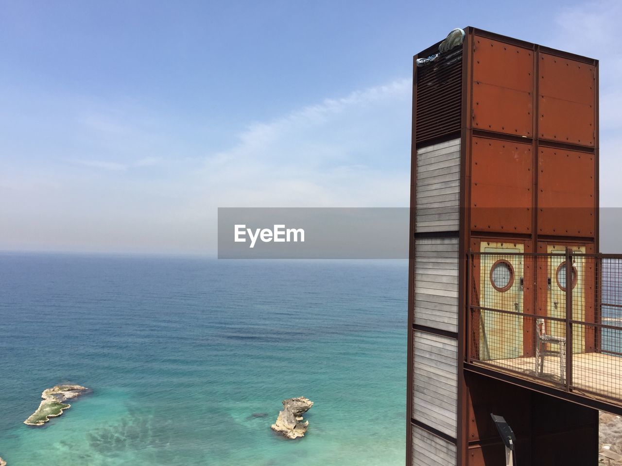 View of calm blue sea against the sky