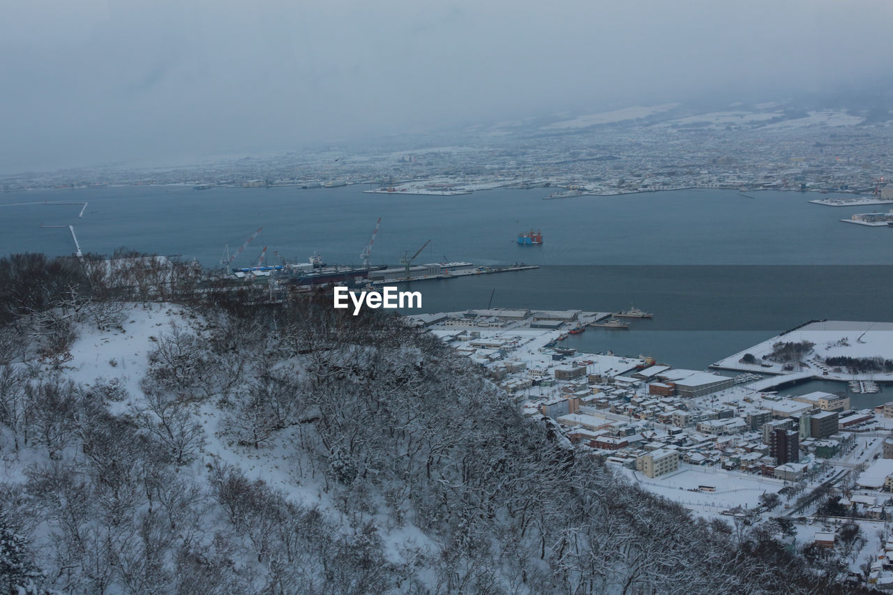 HIGH ANGLE VIEW OF FROZEN SEA DURING WINTER