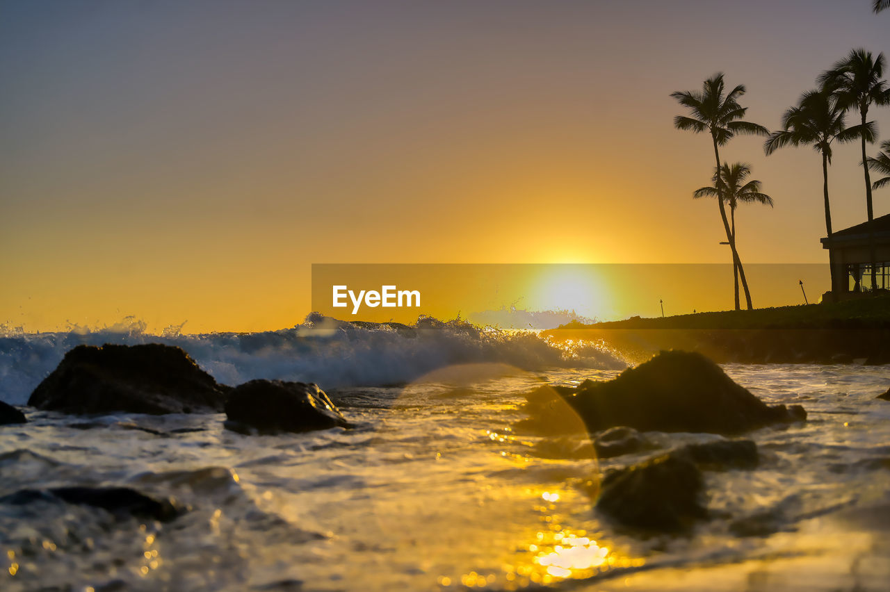 Scenic view of sea against sky during sunset