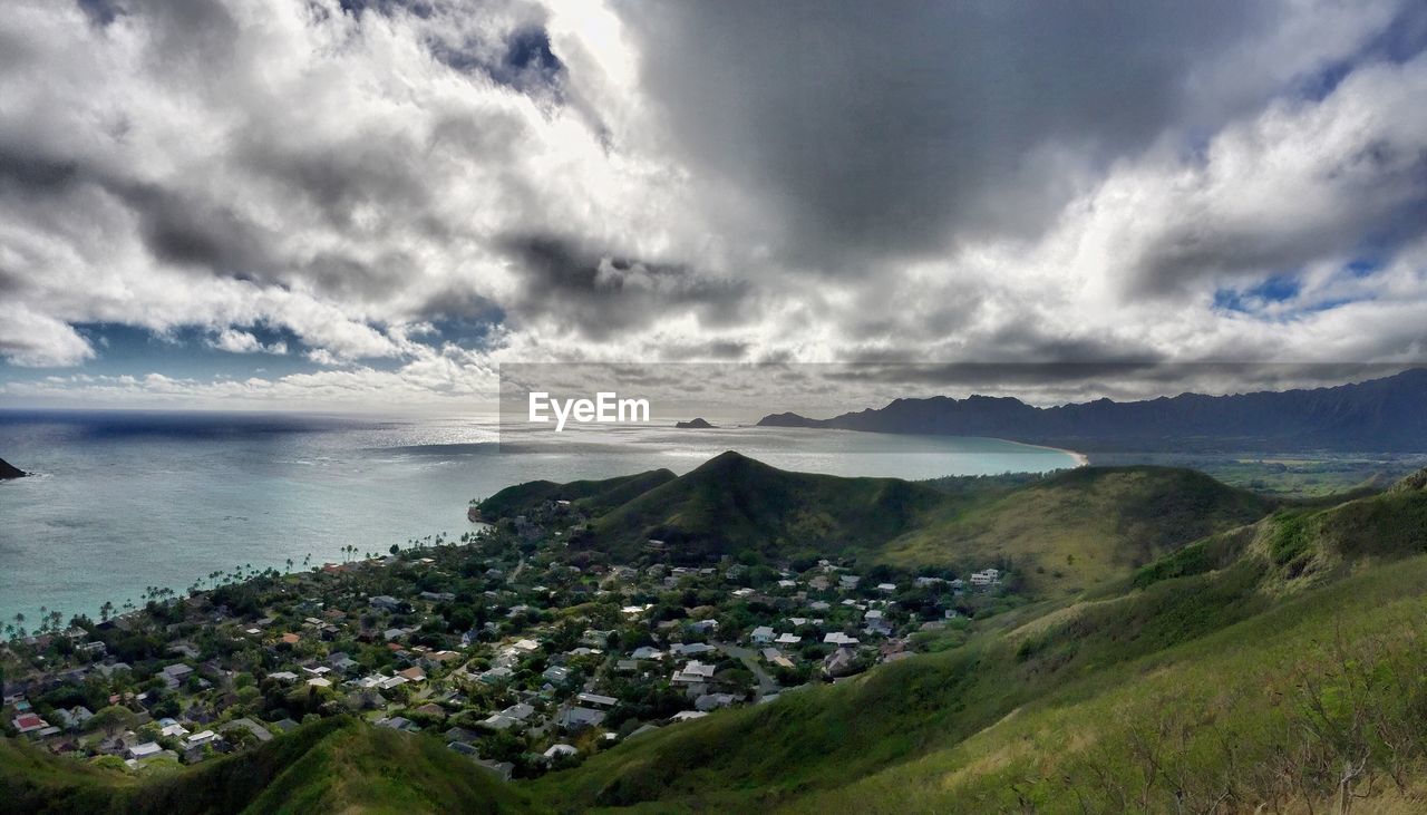 SCENIC VIEW OF SEA AGAINST STORM CLOUDS