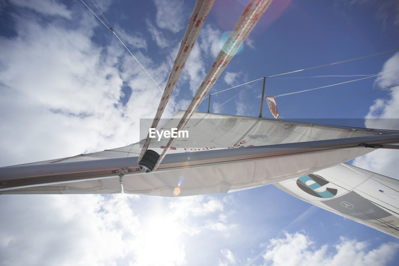 LOW ANGLE VIEW OF SAILBOATS AGAINST SKY