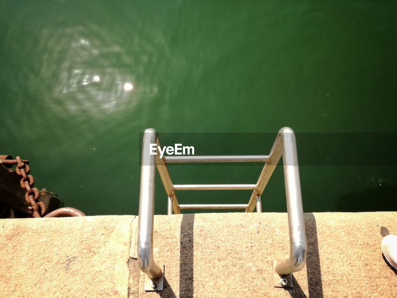 HIGH ANGLE VIEW OF SWIMMING POOL AT PIER