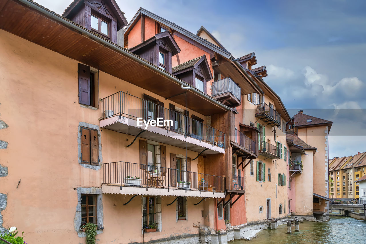 Historic houses along the thiou river in annecy old town, france