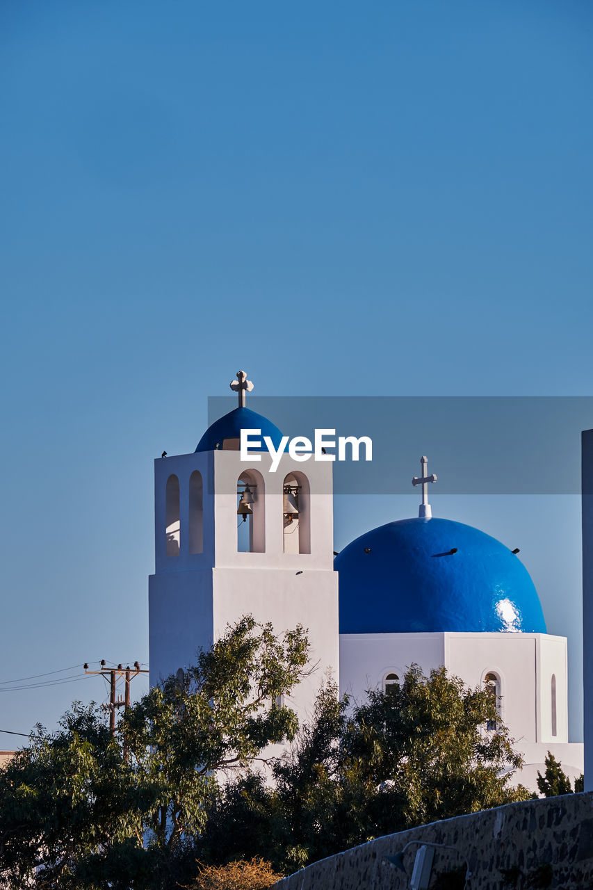 Church of agios gerasimos with its blue dome - santorini, greece