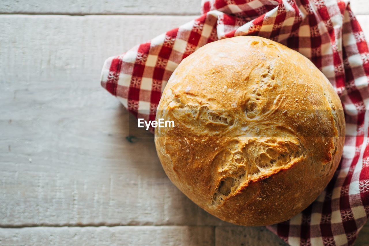 Fresh baked bread on table