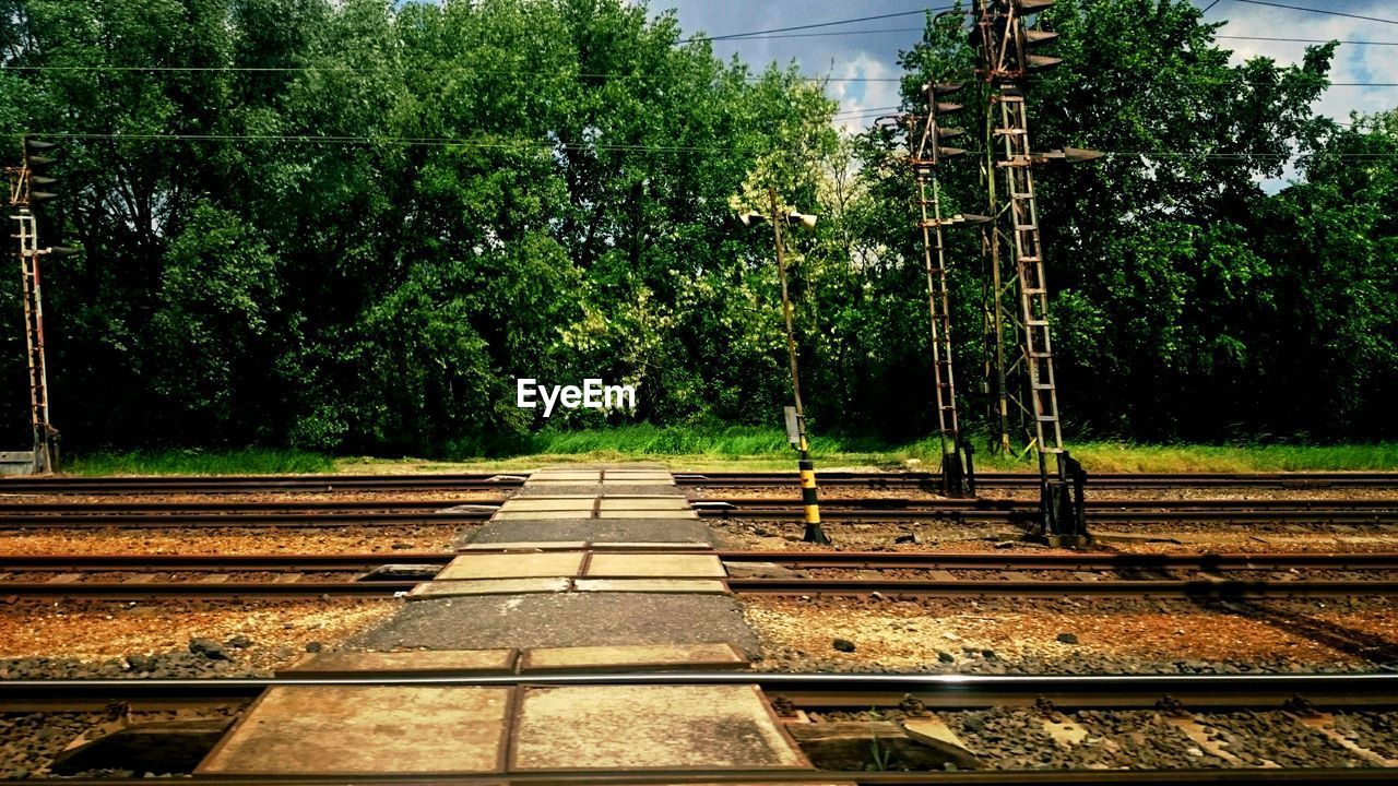 RAILROAD TRACKS AGAINST SKY